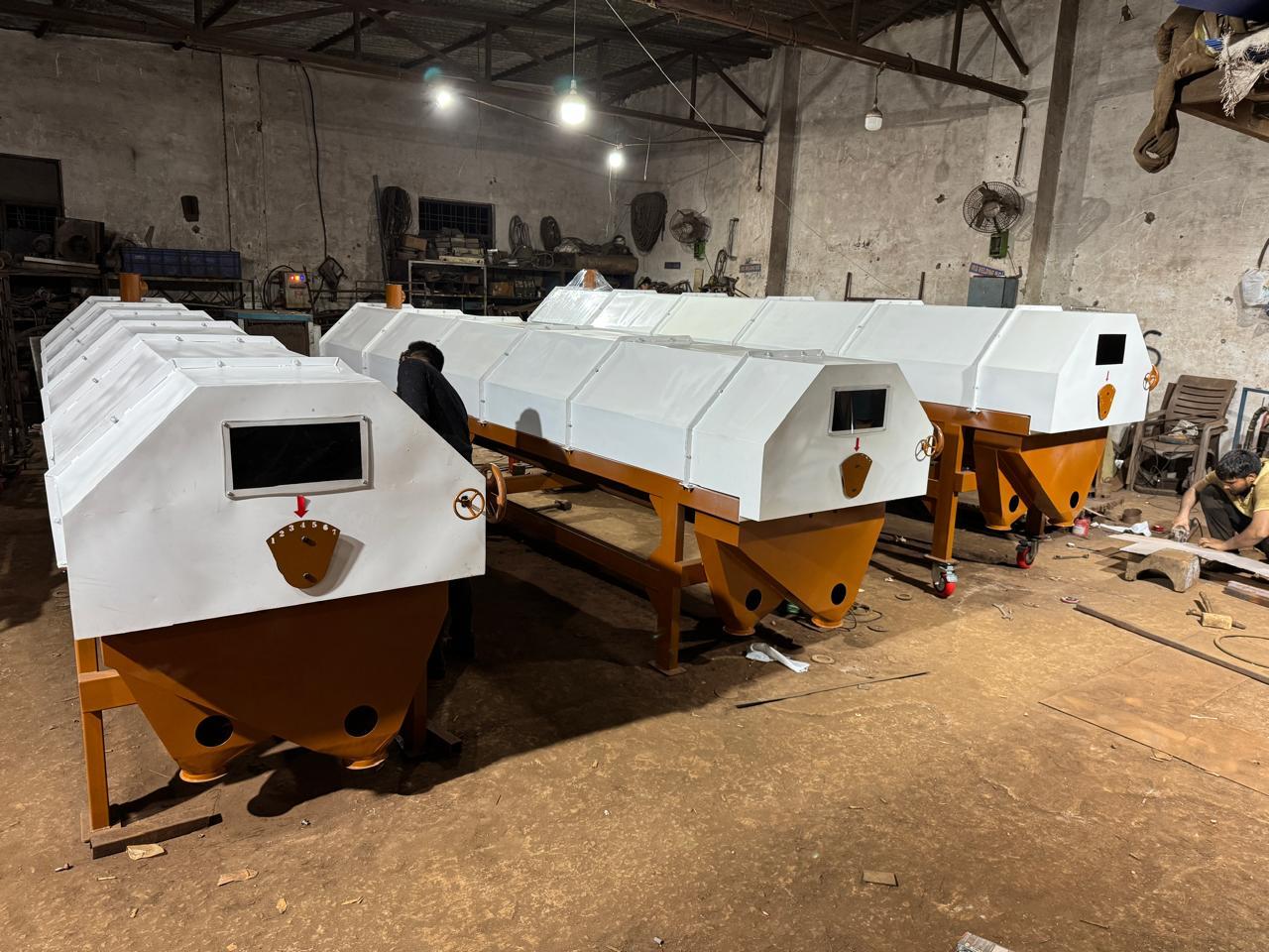 Seed cleaning machines being assembled at the U.S.T Enterprises factory