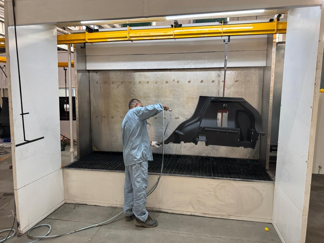 Water curtain paint booth in operation built by U.S.T Enterprises